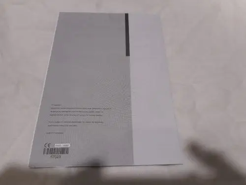 Grau-blätterner Katalog oder Handbuch von Remeha, auf einem hellen Untergrund, mit Barcode und Copyright-Hinweisen auf der Rückseite.